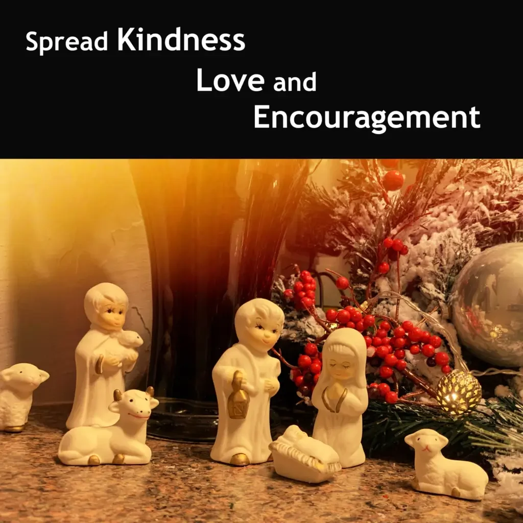 Season of Kindness With Miniature Dolls of Jesus Birth in Background